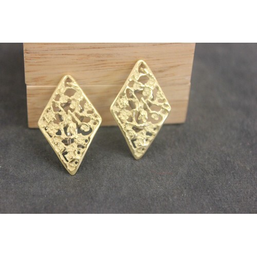 A pair of 18ct gold diamond shaped and pierced earrings, eac...