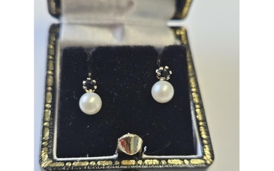 A pair of Gold, Sapphire and Pearl Earrings.