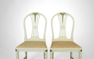 A pair of Gustavian style 'Axet' chairs, bone-painted wood, 20th century.