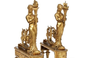 A pair of Louis XVI style gilt bronze chenets