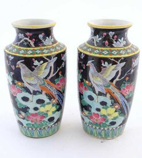 A pair of Oriental vases decorated with stylised