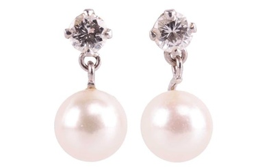 A pair of diamond and cultured pearl drop earrings, each set with a single round brilliant cut diamo