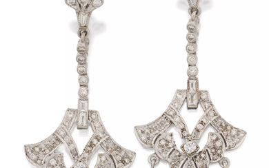 A pair of diamond drop earrings, designed as a pierced...