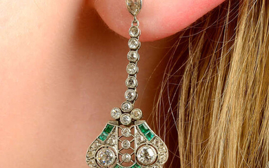 A pair of early 20th century platinum, emerald and diamond pierced lattice earrings.