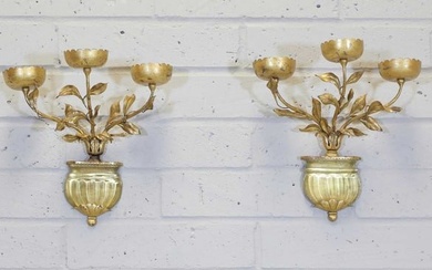 A pair of gold-painted three-branch wall lights