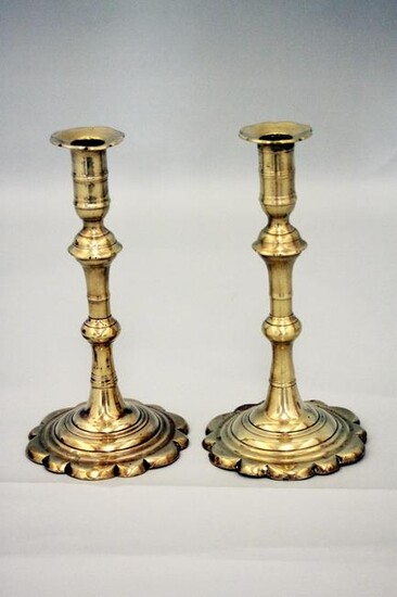 A pair of mid 18th century English brass alternating