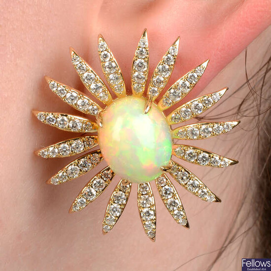 A pair of opal and brilliant-cut diamond floral earrings.