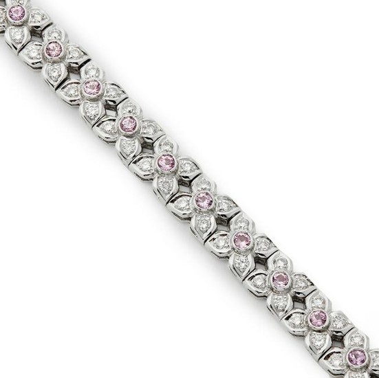 A pink sapphire and diamond line bracelet.