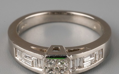 A platinum and diamond ring, set with four princess-cut diam...