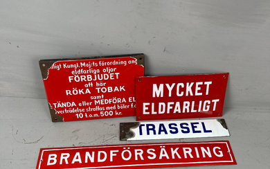 A set of four enamel signs, around the middle of the 20th century or older.