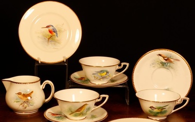 A set of three Royal Worcester teacups and saucers, painted ...