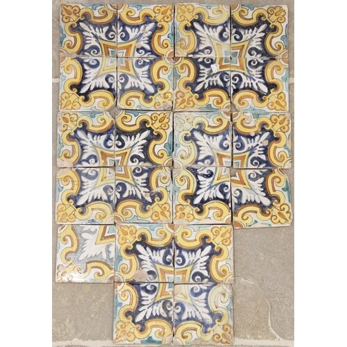A set of twenty Spanish maiolica earthenware tiles, Cataloni...