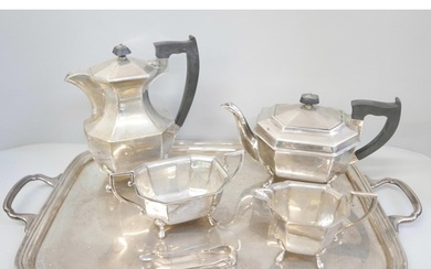 A silver four piece tea service, two handled tray and a pair...