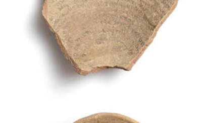 A small Mesopotamian pottery incantation bowl and a fragment of another larger bowl