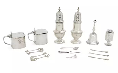 A small group of silver cruets and oddments including a Victorian urn-shaped pepper shaker John...