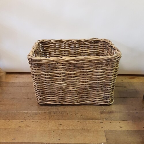 A wicker log basket, 93 cm wide, an oak side table, a child'...
