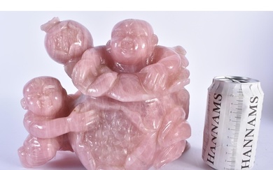 AN EARLY 20TH CENTURY CHINESE CARVED ROSE QUARTZ FIGURE OF T...