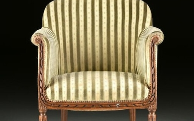 AN ELEGANT LOUIS XVI REVIVAL UPHOLSTERED AND CARVED