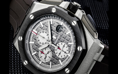 AUDEMARS PIGUET. A TITANIUM AND CERAMIC AUTOMATIC CHRONOGRAPH WRISTWATCH WITH DATE ROYAL OAK OFFSHORE MODEL, REF. 26400IO.OO.A004CA.01
