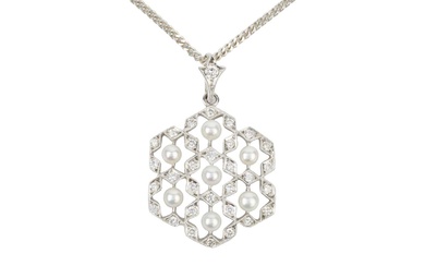 An 18ct white gold, diamond and seed pearl openwork pendant,...