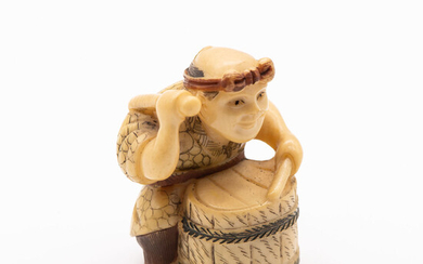 An Antique Japanese Carved Ivory Polychrome Netsuke of a Drummer