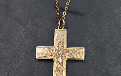 An Edwardian 9ct rose gold cross and chain having floral and foliate engraved decoration, chain