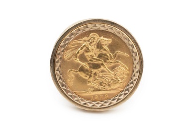 An Elizabeth II sovereign, 1976, in a 9ct gold clip...