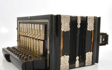 An Empress accordion in original box.
