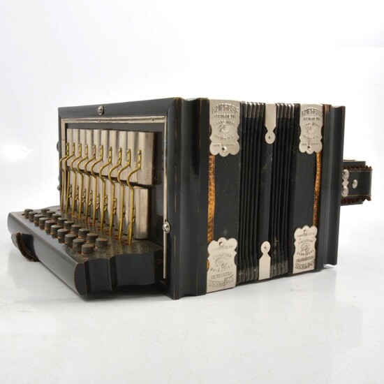 An Empress accordion in original box.