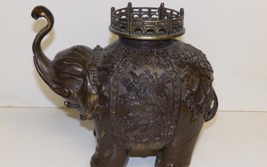 An Oriental bronze elephant incense burner, 9.5" high.