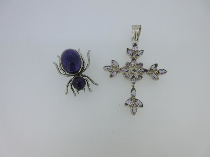 An amethyst pendant cross together with an amethyst set