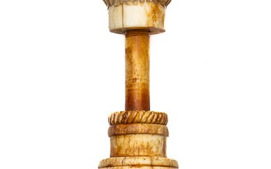 An antique Japanese made bone corkscrew featuring a sailors head...