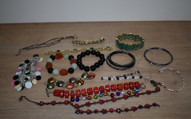 An assortment of costume bracelets including beaded examples, cuff bracelets and bangles etc.