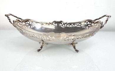 An early 20th century silver two handled basket of oval...