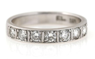 An eternity diamond ring set with eight brilliant-cut diamonds weighing app. 0.80...