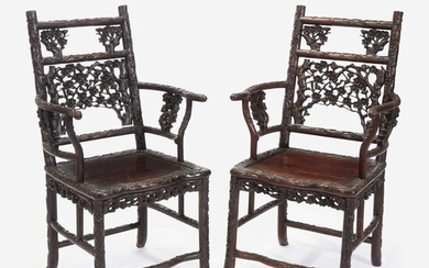 An unusual pair of Chinese carved hardwood armchairs 中国硬木扶手椅一对 Late 19th to early 20th Century 十九世纪晚期至二十世纪早期
