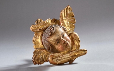 Angel in patinated and gilded wood.