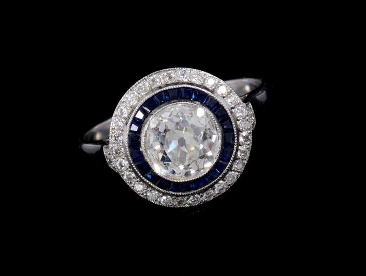Art Deco style diamond and sapphire halo cluster ring