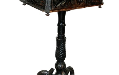 Black Forest dressing table on naturalistic pedestal base