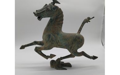 Bronze model of Flying Horse of Gansu. {35 cm H x 44 cm W x ...
