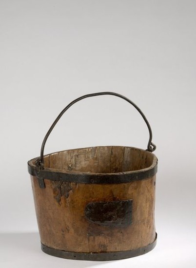 Bucket made of monoxyl pine, iron rimmed and...