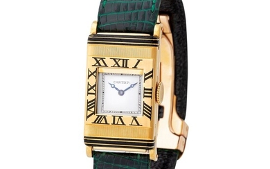Cartier. Very Unusual and Extremely Rare Art Deco Bebè Guillotin Wristwatch in Yellow Gold With Black Enamel Bezel, Concealed Dial and Certificate