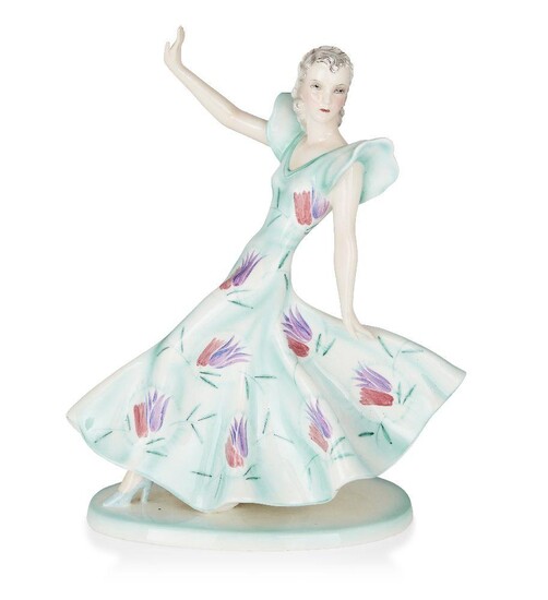 Claire Weiss (1906-1997) for Goldscheider, Model of a female dancer in in a turquoise dress with purple and pink flowers, model no. 8030, circa 1938, Glazed ceramic, Impressed marks 'Goldscheider/Wien/MADE IN AUSTRIA/Claire Weiss', and model...