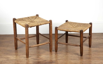 Cotswold School ash, two low stools, with rush seats o...