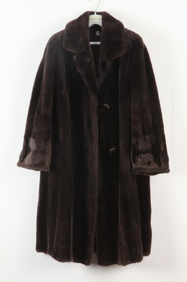 DARK BROWN SHEARED FUR STROLLER COAT WITH CUFFED SLEEVES. No...