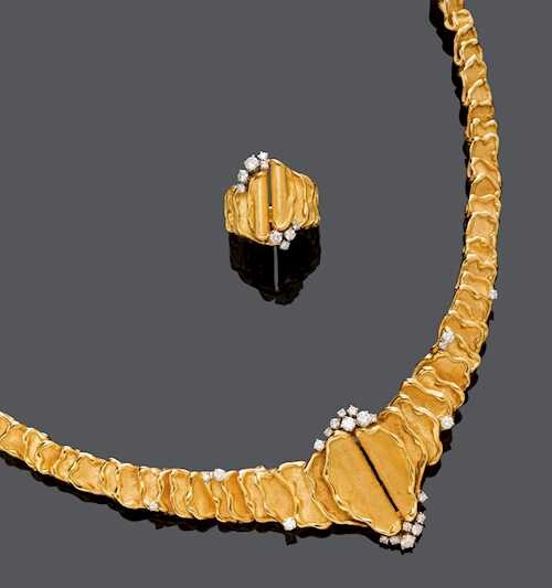 DIAMOND AND GOLD NECKLACE WITH RING, BY GILBERT ALBERT.