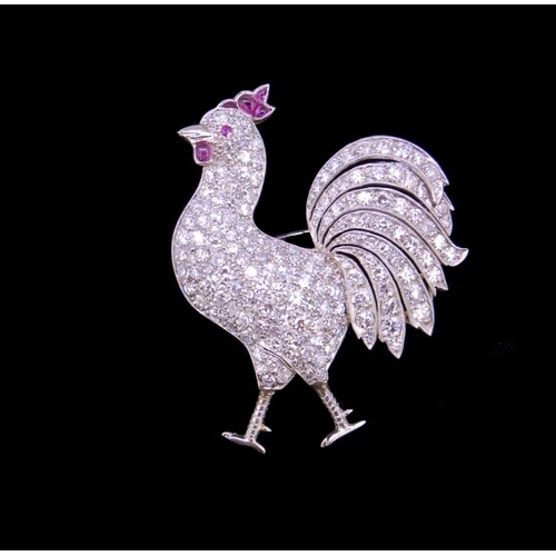 DIAMOND AND RUBY ROOSTER BROOCH, set with diamonds to the bo...