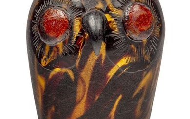 Daum (French Est.1879), an unusual ‘Owl’ vase the glass simulating tortoiseshell, Signed in relief on the underside of the base ‘D 1911’, The small vessel with crimped, slightly inverted rim, applied with a beak and eyes over foil, 10.8 cm high