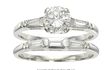 Diamond, White Gold Rings Stones: Round brilliant-cut diamond weighing...