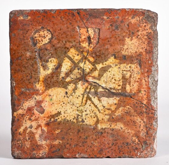 Glazed terracotta paving tile with engobe with a crossed decoration. France, 13th-14th century. Broken and glued. A second glazed terracotta tile of the same period is attached to it, decorated with a fleur de lys. Respective dimensions: 15x15 cm and...